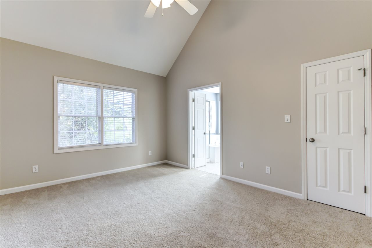 2316 Lemuel Drive Raleigh, NC 27615 - Photo 6 of 13 Spacious master suite with vaulted ceilings, fresh paint and NEW CARPET throughout; nothing to do but move in! The WALK-IN closet has tons of space and extra storage too. Master Bedroom