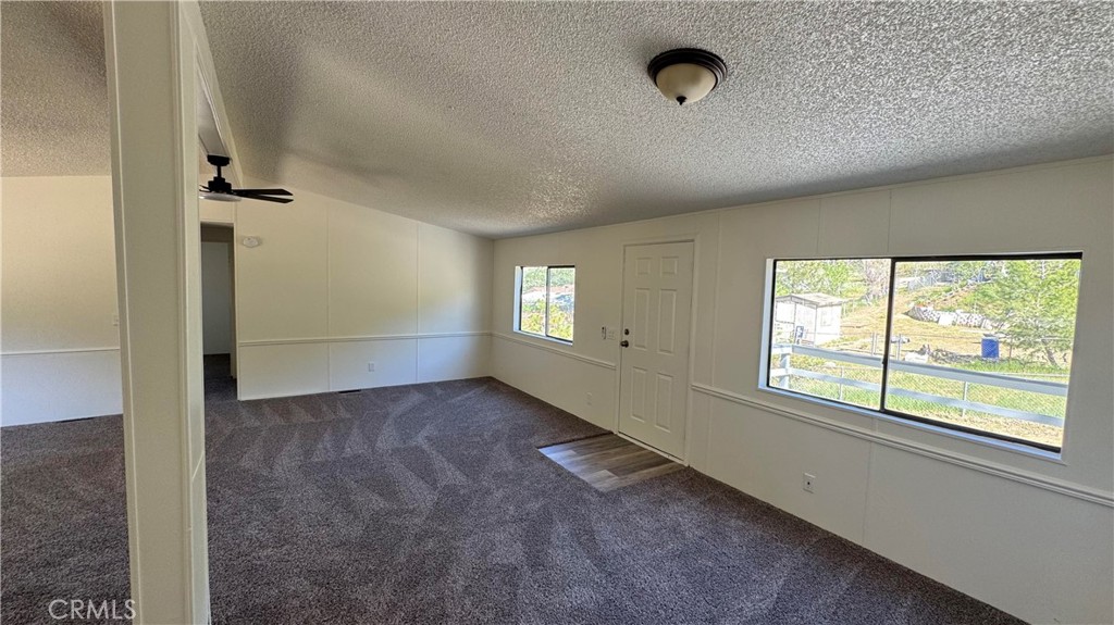 2720 Lebec Oaks Road Lebec, CA 93243 - Photo 9 of 24 a view of an empty room with a window