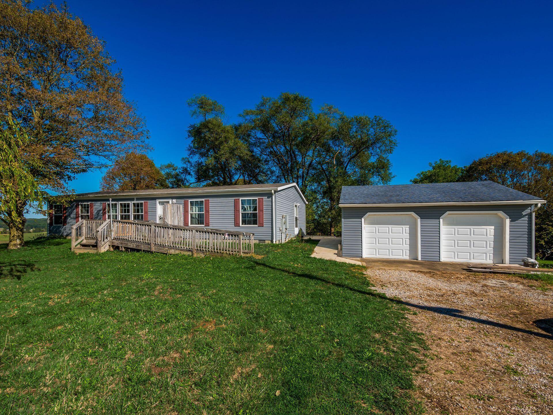 A 3 bedroom, 2 bath ranch on over an acre.
