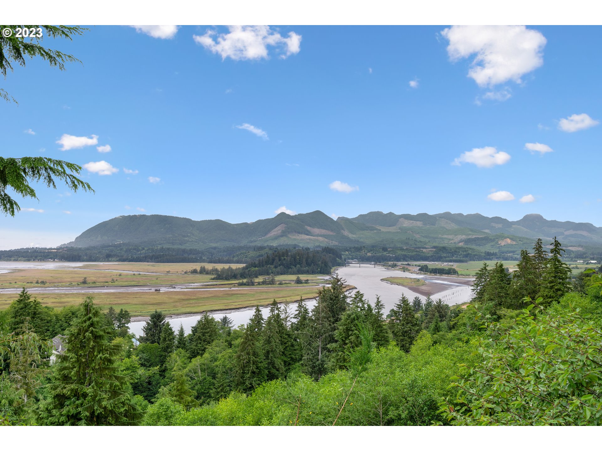 4th Street Wheeler, OR 97147 - Photo 9 of 24 a view of lake with mountain