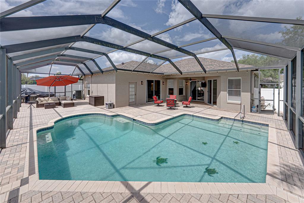 1542 Swamp Rose Lane Trinity, FL 34655 - Photo 3 of 64 a view of outdoor space with seating area