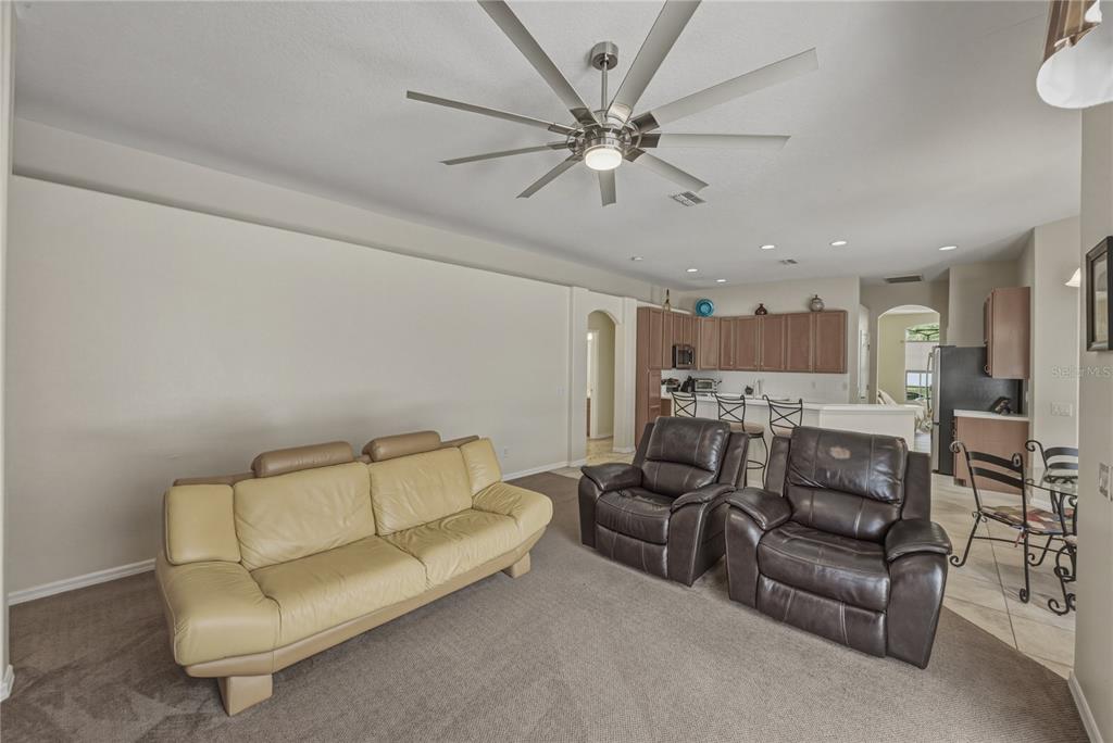 1542 Swamp Rose Lane Trinity, FL 34655 - Photo 34 of 64 a living room with furniture