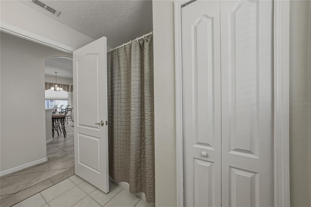 1542 Swamp Rose Lane Trinity, FL 34655 - Photo 48 of 64 a view of a bathroom with sink
