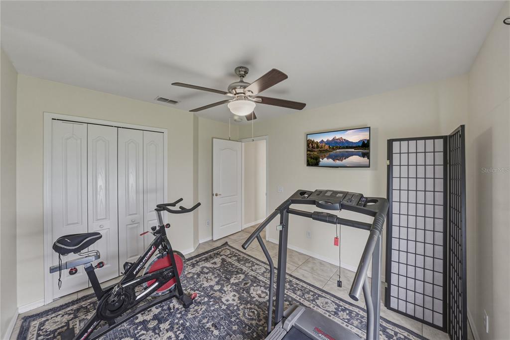 1542 Swamp Rose Lane Trinity, FL 34655 - Photo 50 of 64 a view of a workspace with furniture