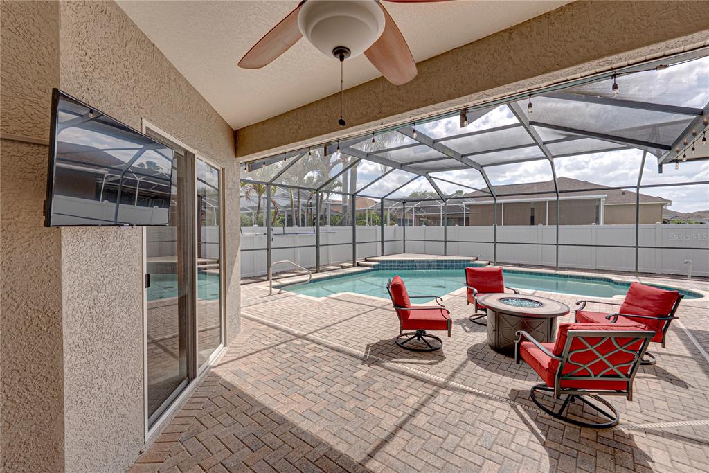 1542 Swamp Rose Lane Trinity, FL 34655 - Photo 54 of 64 a view of a room with gym equipment