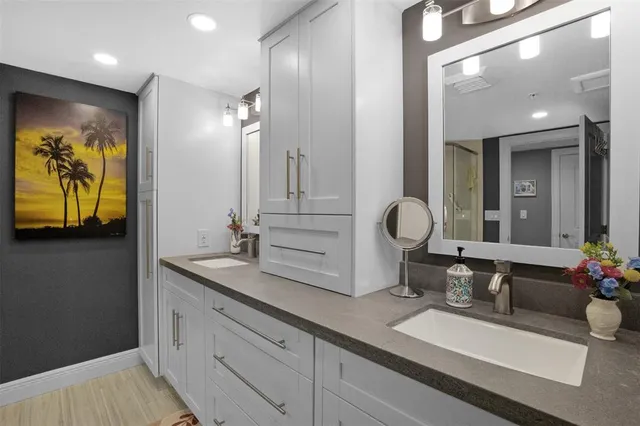 a bathroom with a sink and a mirror