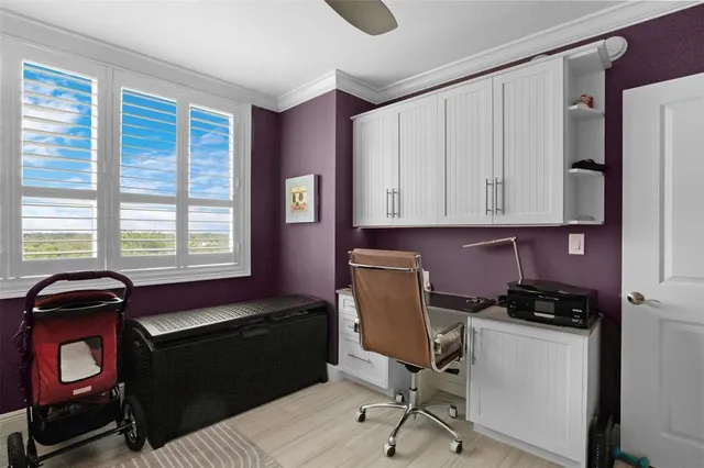 a kitchen with a window a stove and a sink