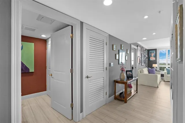 a view of a livingroom with furniture and hardwood floor