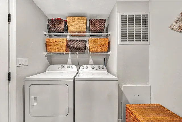 a utility room with dryer and washer