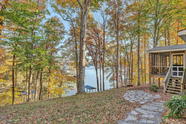 a view of a backyard of the house
