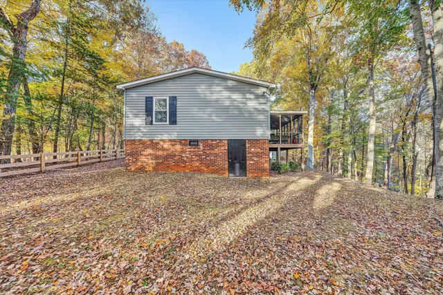 a house view with a backyard space