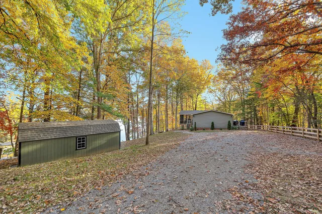a backyard of a house with lots of green space