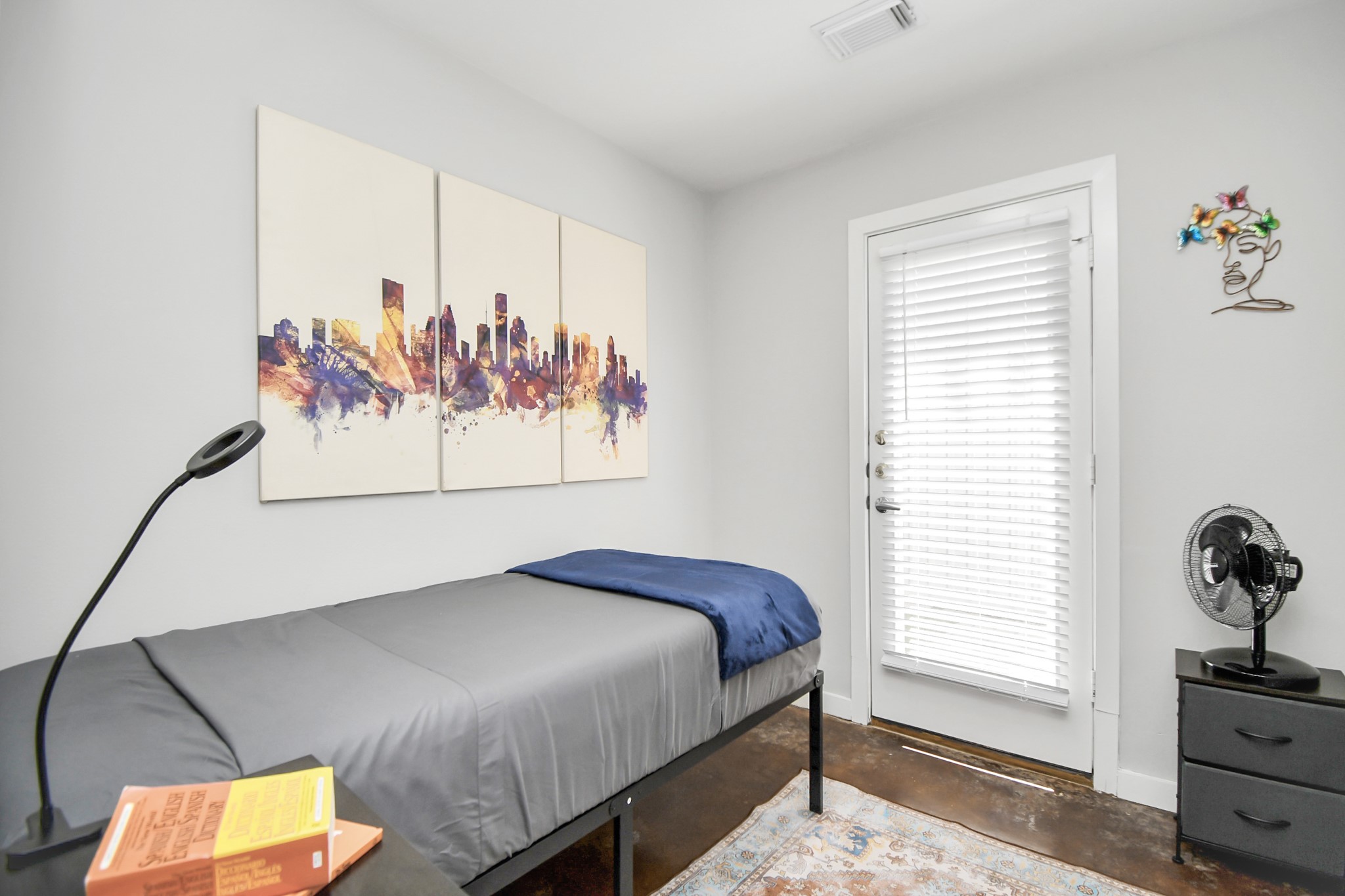 1806 Drew Street Houston, TX 77004 - Photo 11 of 17 a bedroom with a bed and a window