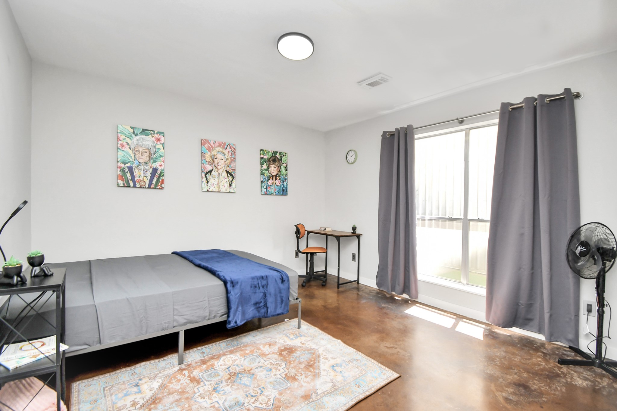 1806 Drew Street Houston, TX 77004 - Photo 12 of 17 a bedroom with a bed and a window