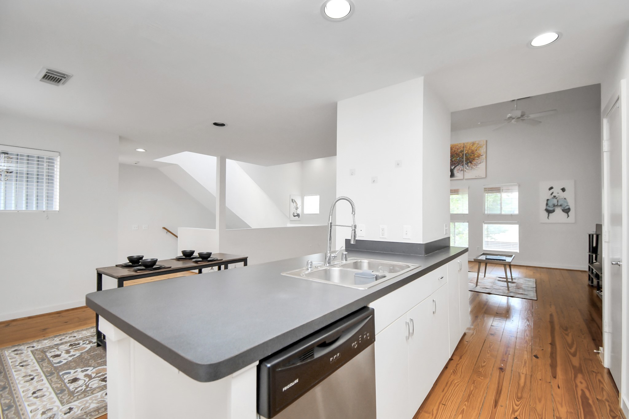 1806 Drew Street Houston, TX 77004 - Photo 7 of 17 a kitchen with a sink a stove and cabinets