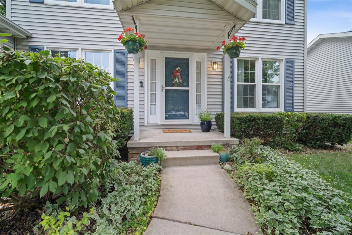 1024 Kings Mill Road Normal, IL 61761 - Photo 2 of 21 a front view of a house with a yard