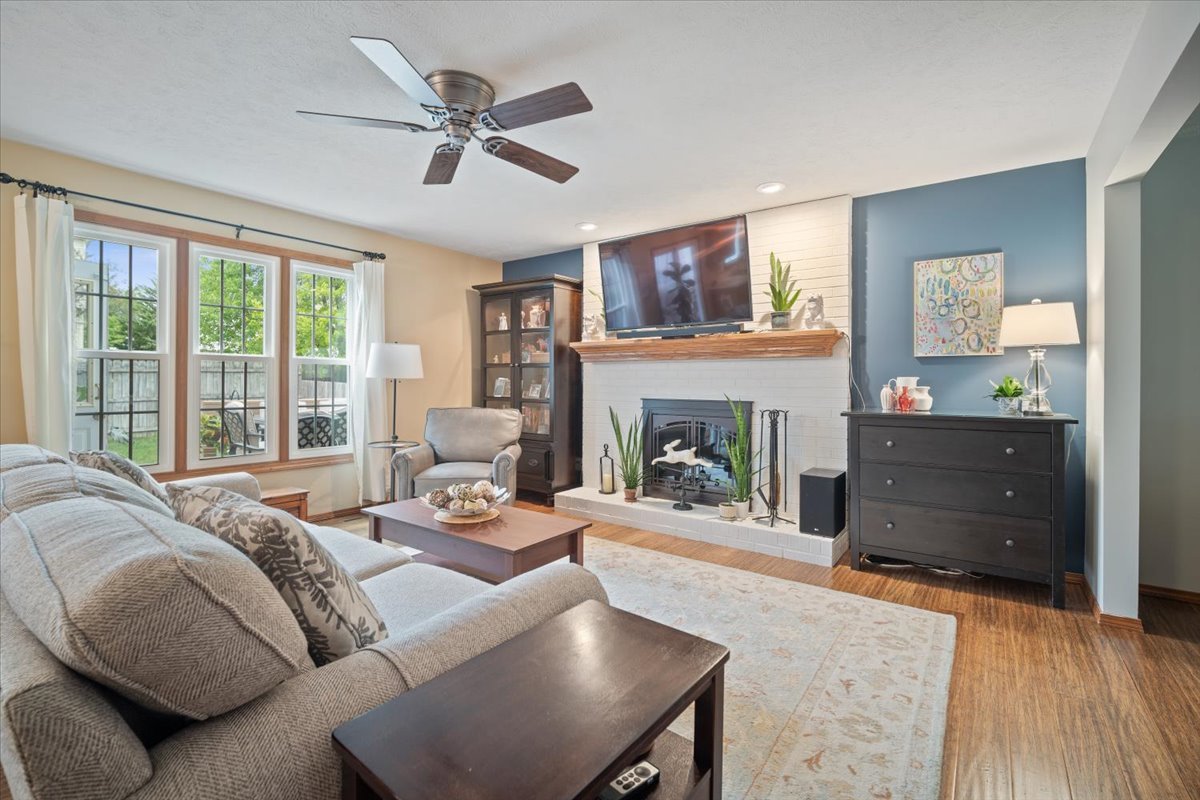 1024 Kings Mill Road Normal, IL 61761 - Photo 3 of 21 a living room with furniture fireplace and a large window