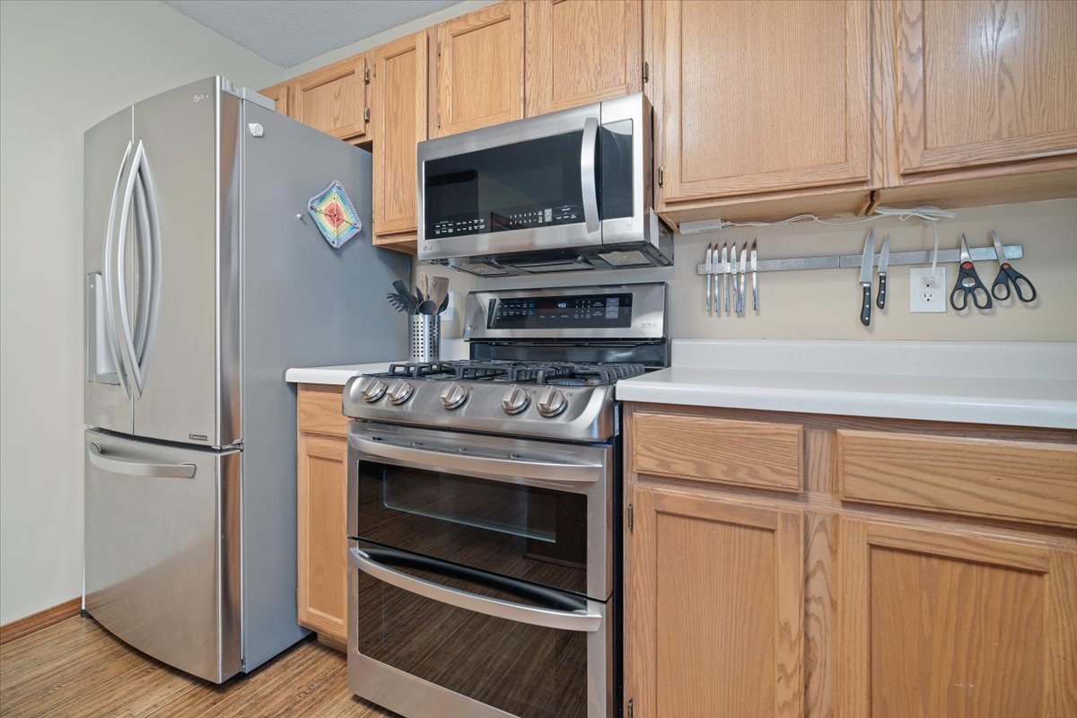 1024 Kings Mill Road Normal, IL 61761 - Photo 6 of 21 a kitchen with a stove and a microwave