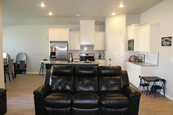 a living room with furniture and a couch