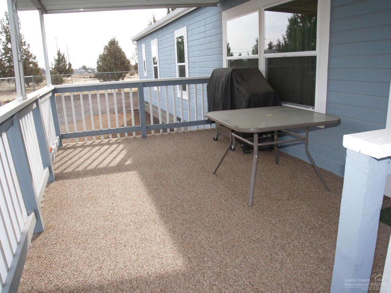 7162 Southwest Shad Road Terrebonne, OR 97760 - Photo 19 of 24 Rear covered deck for comfort in late af