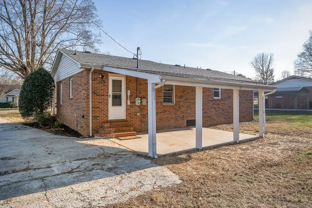 a view of swimming pool with outdoor seating