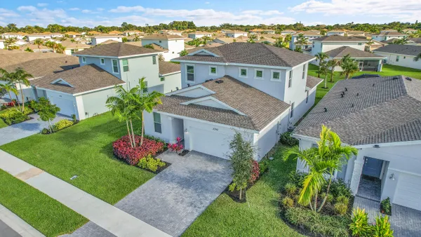 an aerial view of a house with a garden