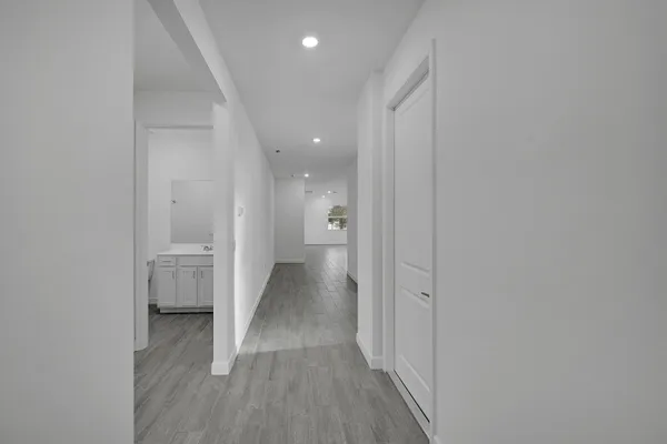 a view of a hallway with an empty room