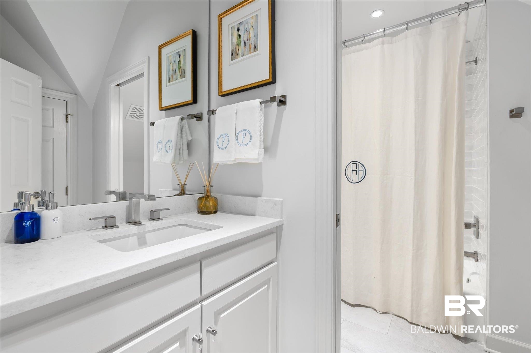 320 Long Court Mobile, AL 36608 - Photo 39 of 61 Bathroom featuring shower / tub combo, lofted ceiling, vanity, and tile patterned flooring