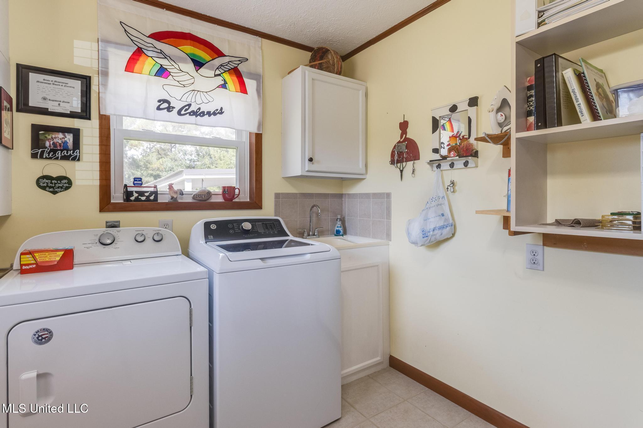 4513 Gibson Road Ocean Springs, MS 39564 - Photo 20 of 30 Laundry Room