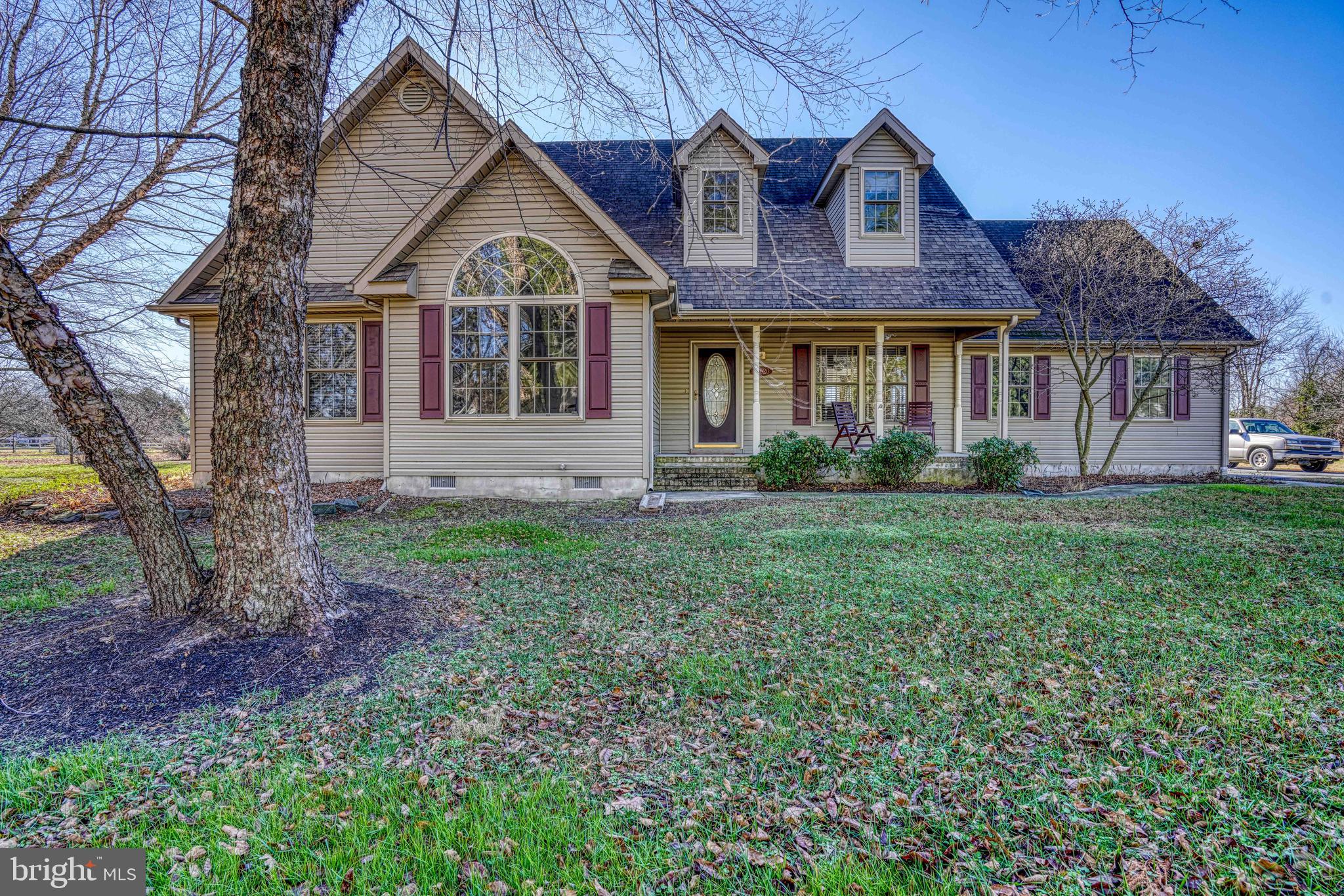 36620 Robin Hood Road Delmar, DE 19940 - Photo 1 of 48 a front view of a house with garden