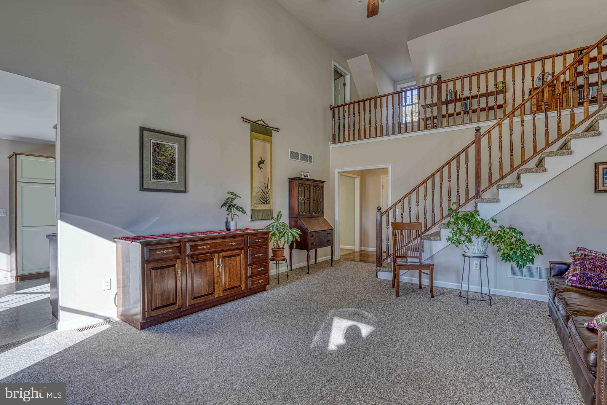 36620 Robin Hood Road Delmar, DE 19940 - Photo 14 of 48 a living room with furniture and stairs