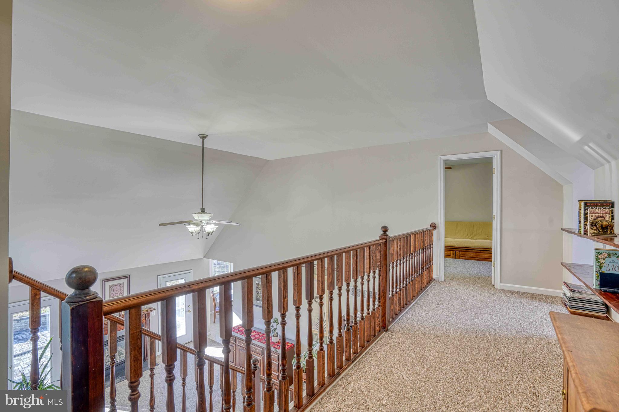 36620 Robin Hood Road Delmar, DE 19940 - Photo 28 of 48 a view of a hallway with workspace and stairs