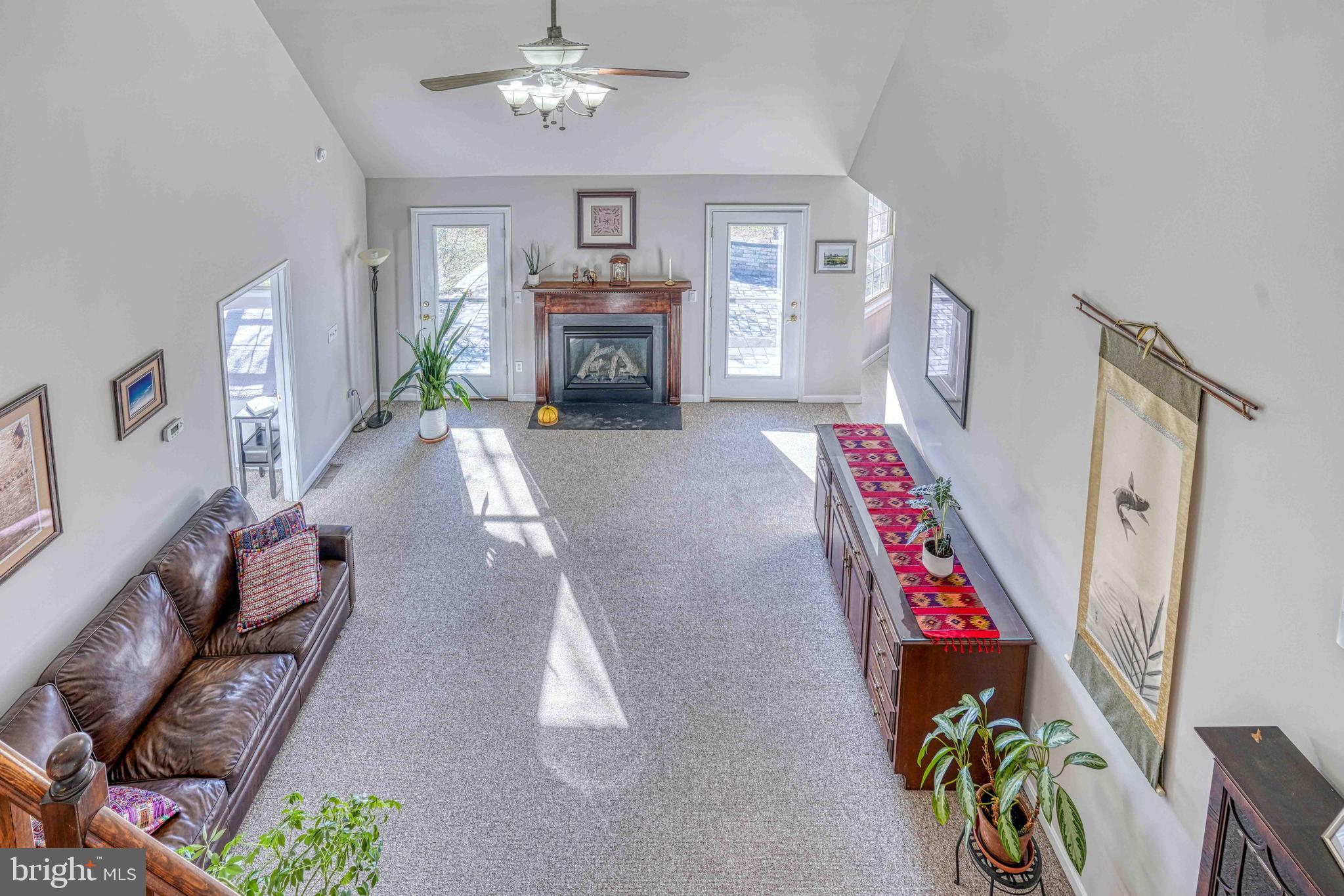 36620 Robin Hood Road Delmar, DE 19940 - Photo 29 of 48 a living room with furniture fireplace and a window