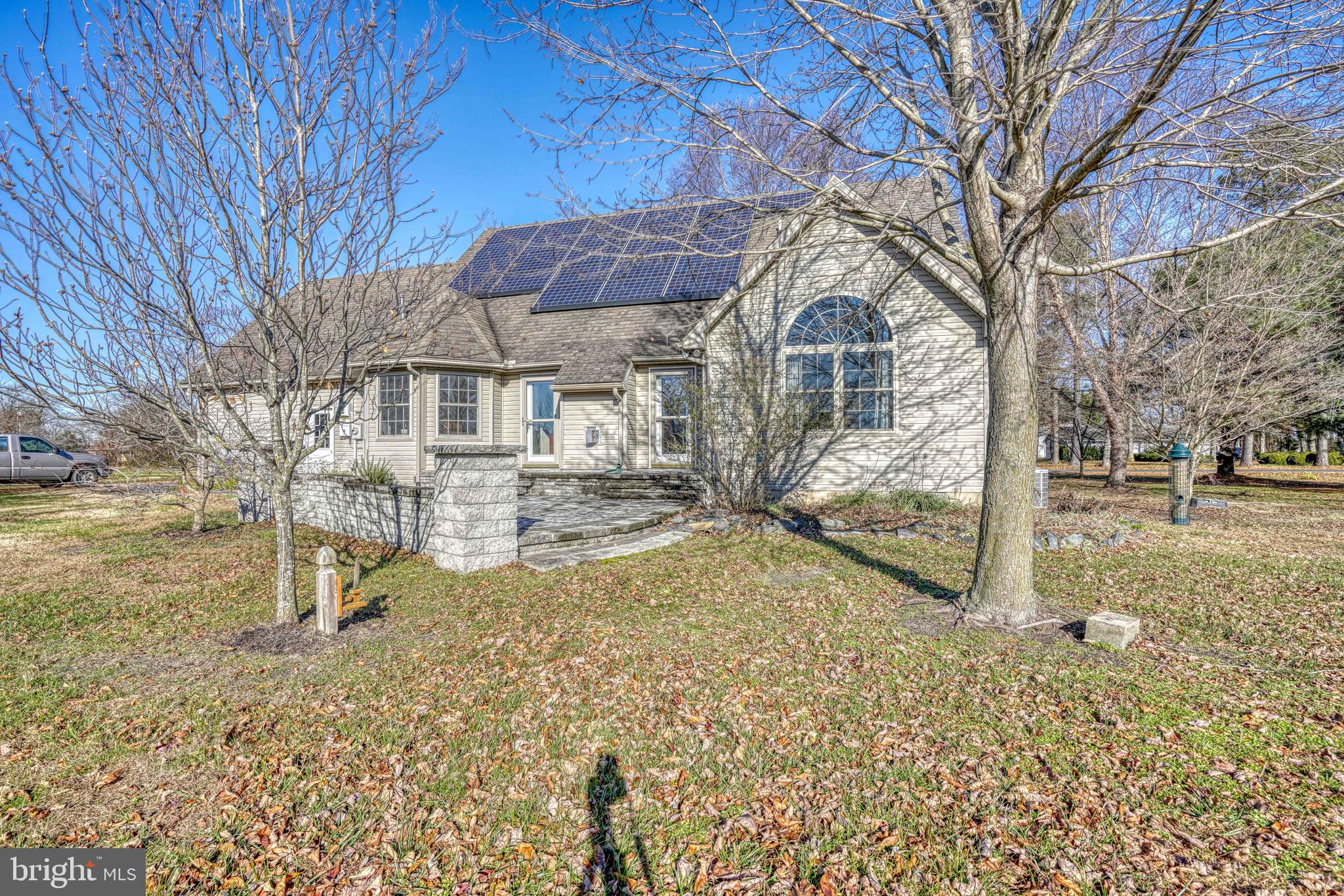 36620 Robin Hood Road Delmar, DE 19940 - Photo 36 of 48 a view of a large house with a yard