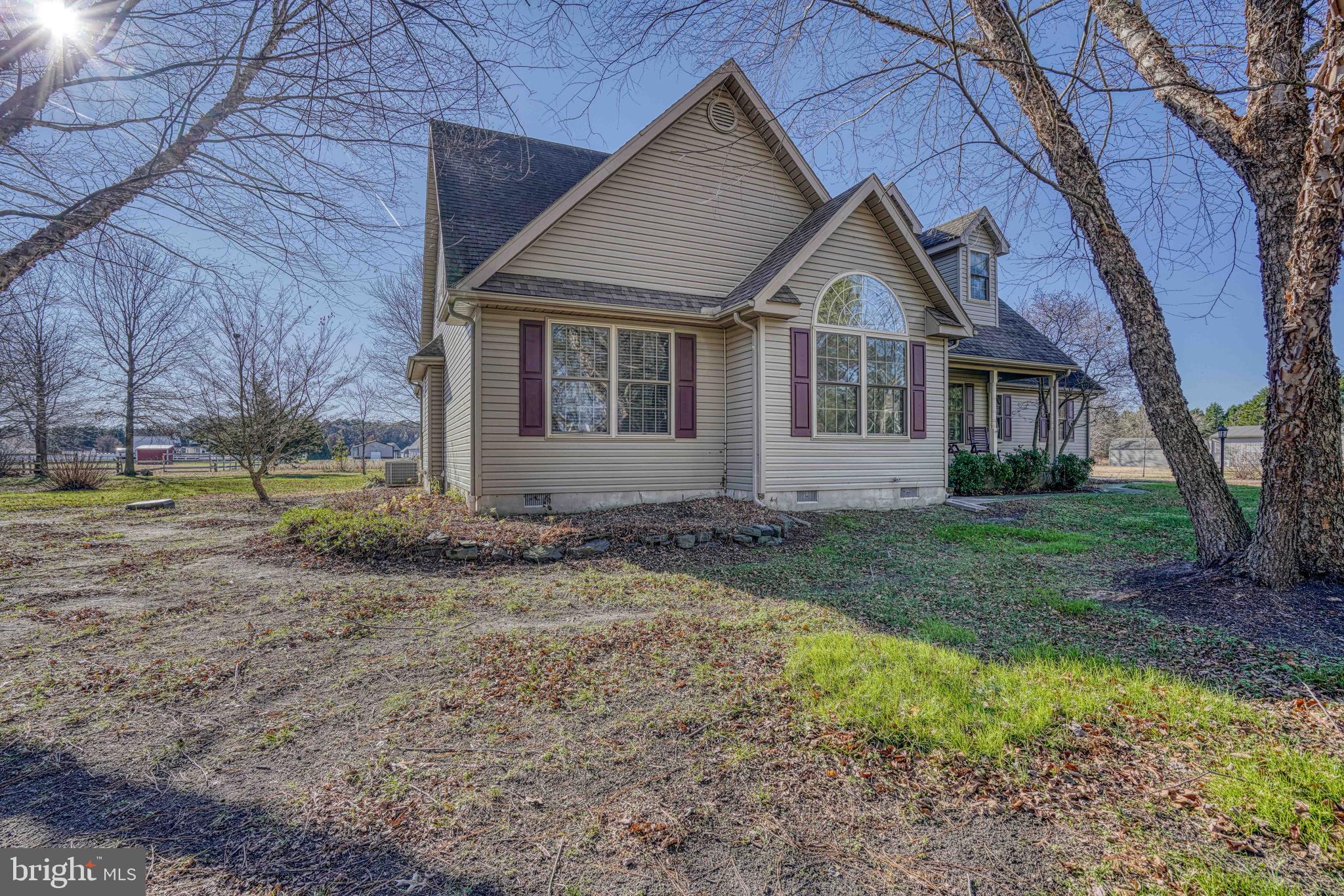 36620 Robin Hood Road Delmar, DE 19940 - Photo 4 of 48 a front view of a house with a yard