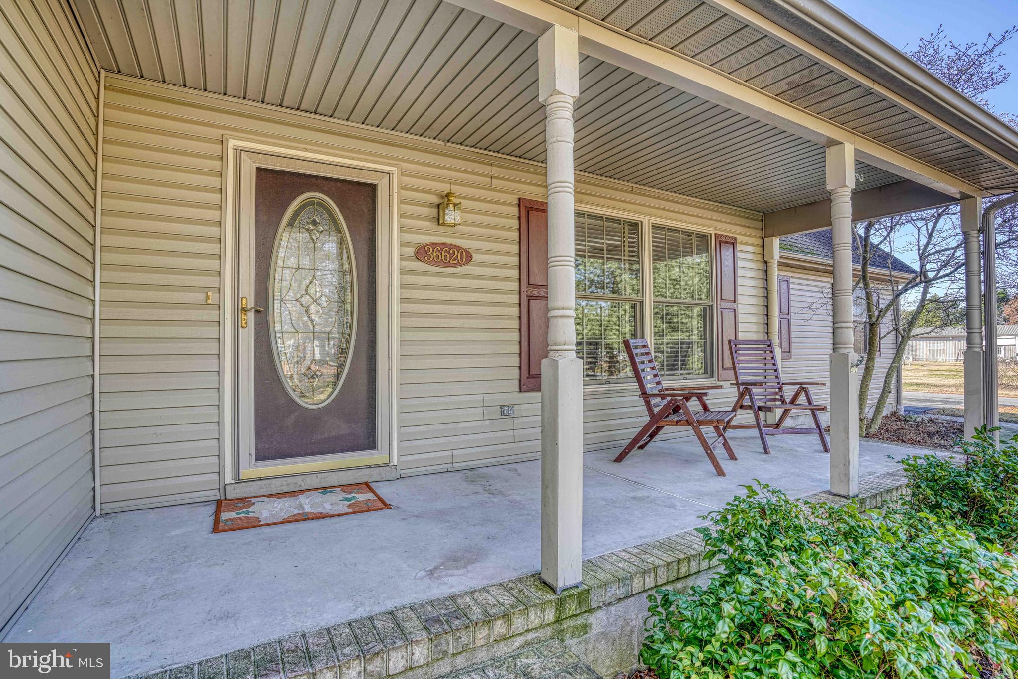 36620 Robin Hood Road Delmar, DE 19940 - Photo 5 of 48 an outdoor view with patio