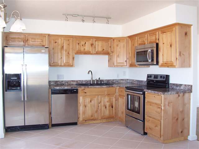 2301 West N 7th Snowflake, AZ 85937 - Photo 3 of 9 a kitchen with stainless steel appliances granite countertop a refrigerator stove and sink