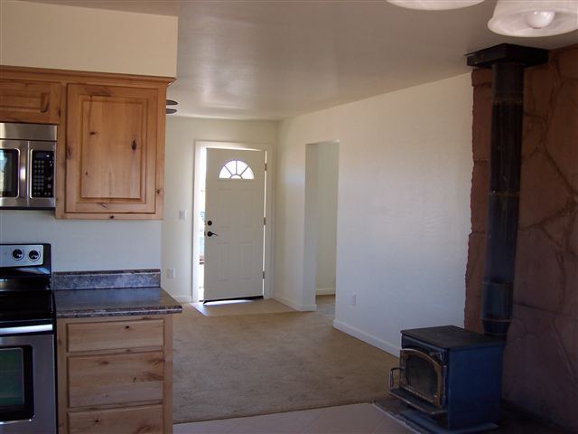 2301 West N 7th Snowflake, AZ 85937 - Photo 4 of 9 a view of kitchen with cabinets and wooden floor
