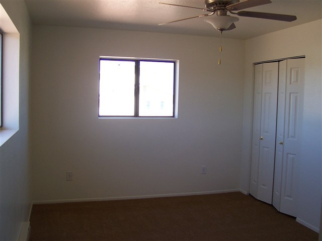 2301 West N 7th Snowflake, AZ 85937 - Photo 6 of 9 an empty room with a window
