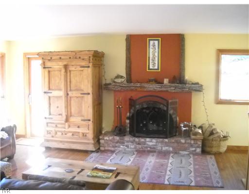 1329 Thurgau Court Incline Village, NV 89451 - Photo 2 of 11 a view of a livingroom with a fireplace and window
