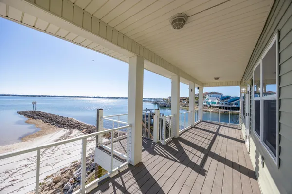 a view of a balcony with an outdoor space