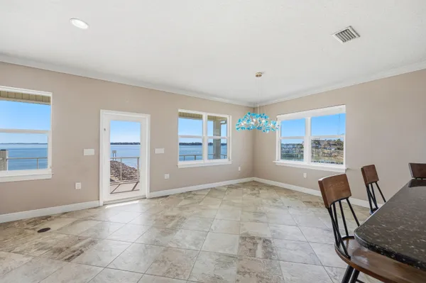 a view of livingroom with furniture and windows