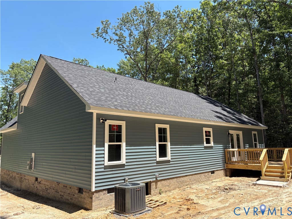 15135 Lebanon Road Spring Grove, VA 23881 - Photo 18 of 19 New construction home with blue siding, a dark shi