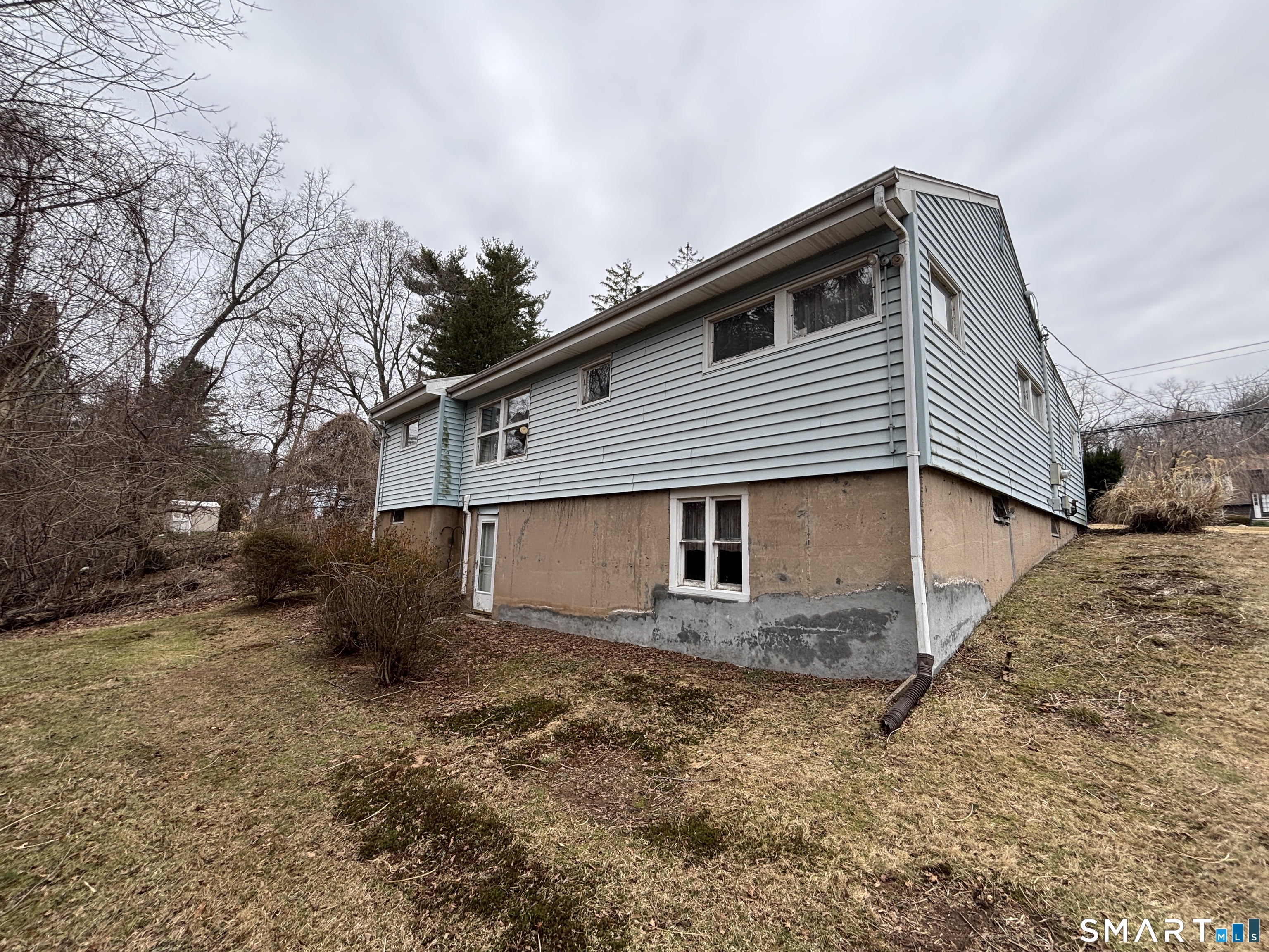 44 Upper State Street North Haven, CT 06473 - Photo 2 of 11 a backyard of a house