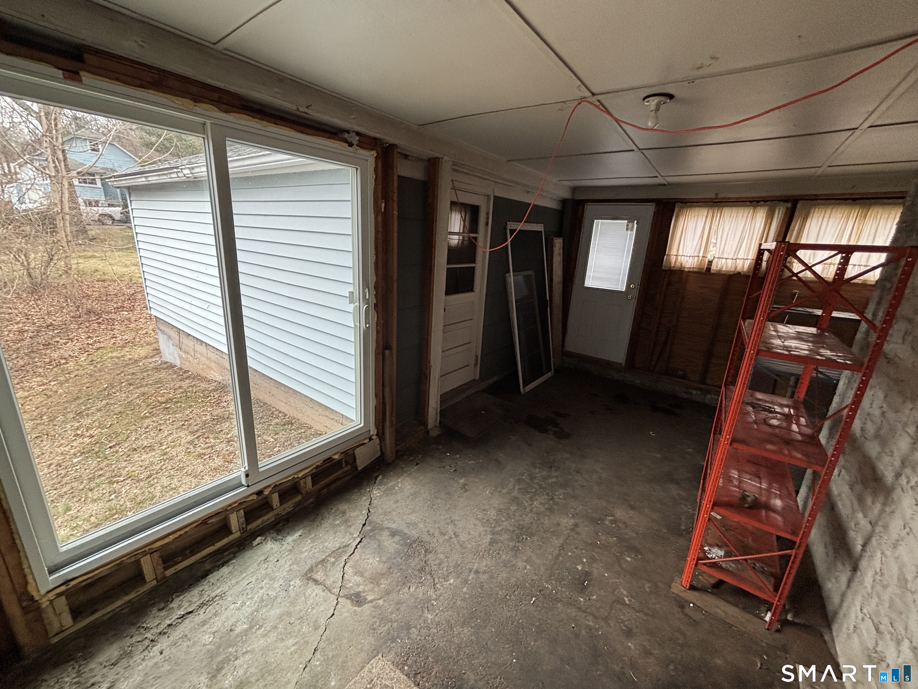 44 Upper State Street North Haven, CT 06473 - Photo 8 of 11 a view of an empty room with a window