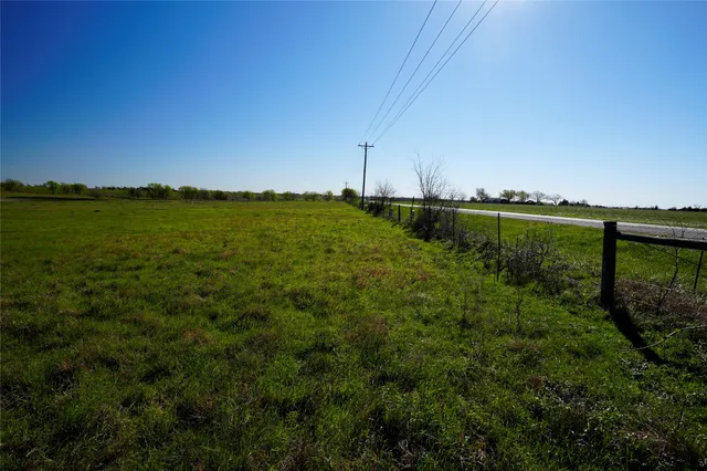 a view of a lake from a yard