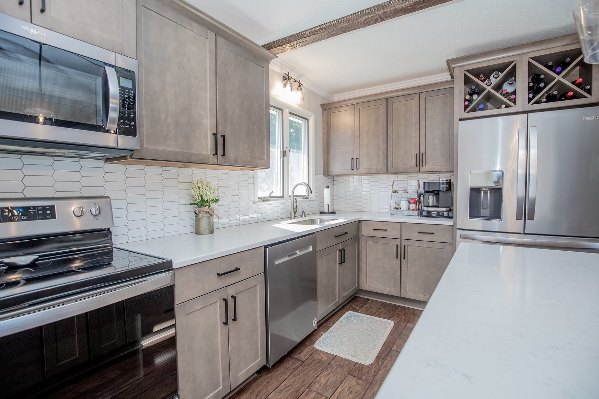 385 Lee Road Cottontown, TN 37048 - Photo 12 of 34 a kitchen with cabinets stainless steel appliances and a counter space