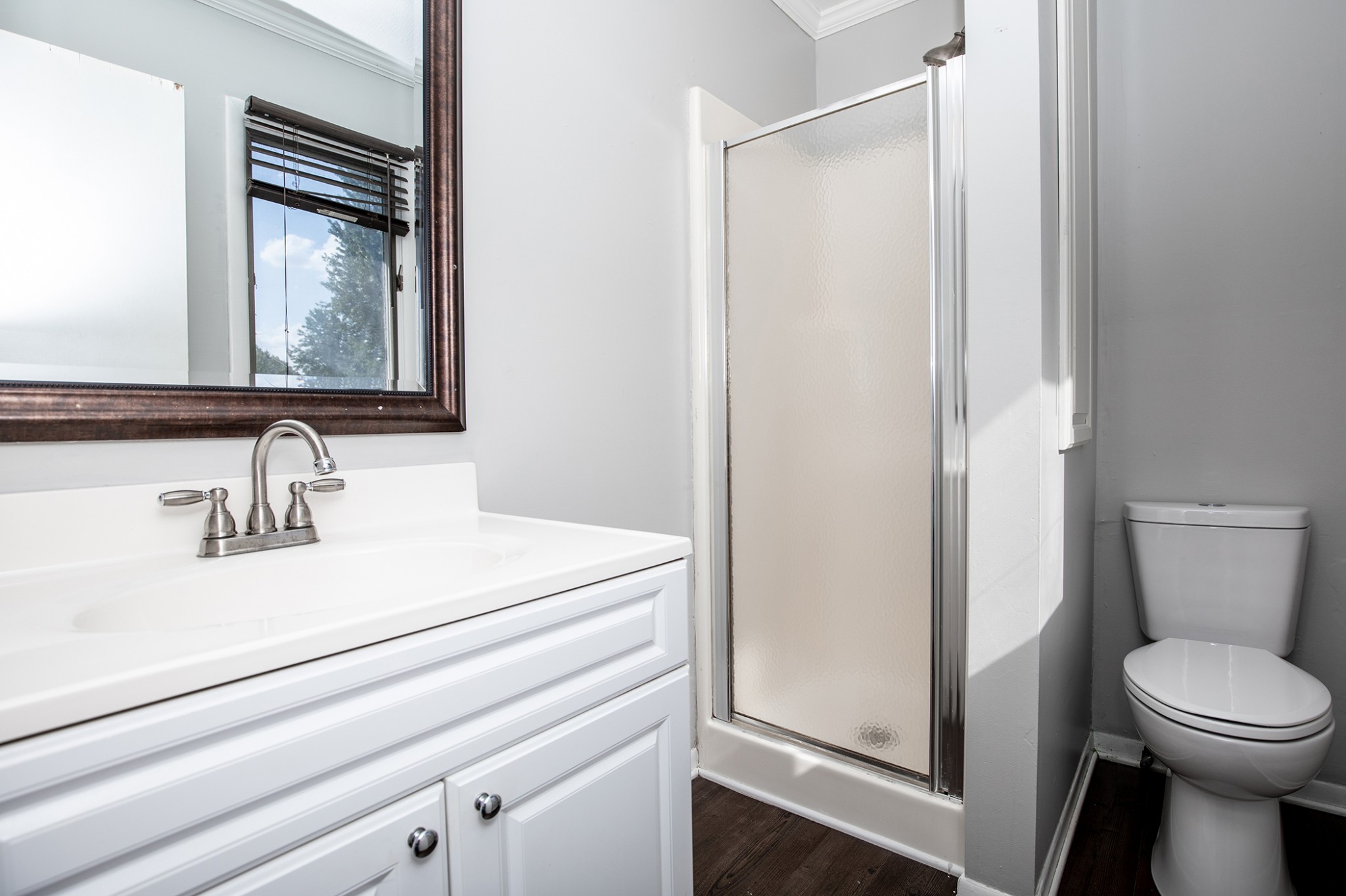 385 Lee Road Cottontown, TN 37048 - Photo 25 of 34 a bathroom with a sink toilet and mirror