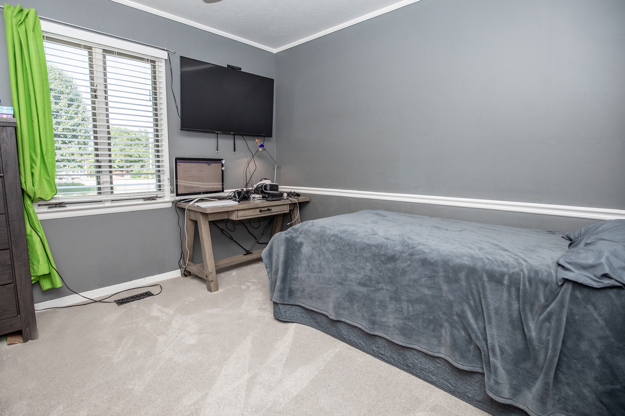 385 Lee Road Cottontown, TN 37048 - Photo 27 of 34 a bedroom with a bed and a flat screen tv