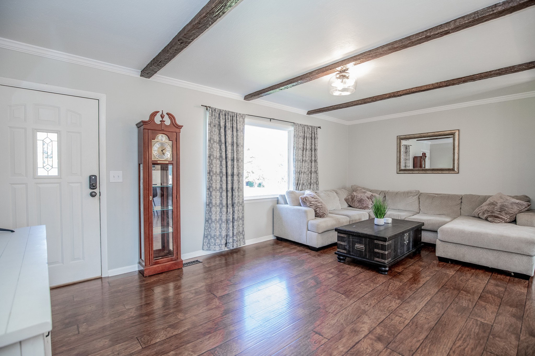 385 Lee Road Cottontown, TN 37048 - Photo 7 of 34 a living room with furniture and a wooden floor